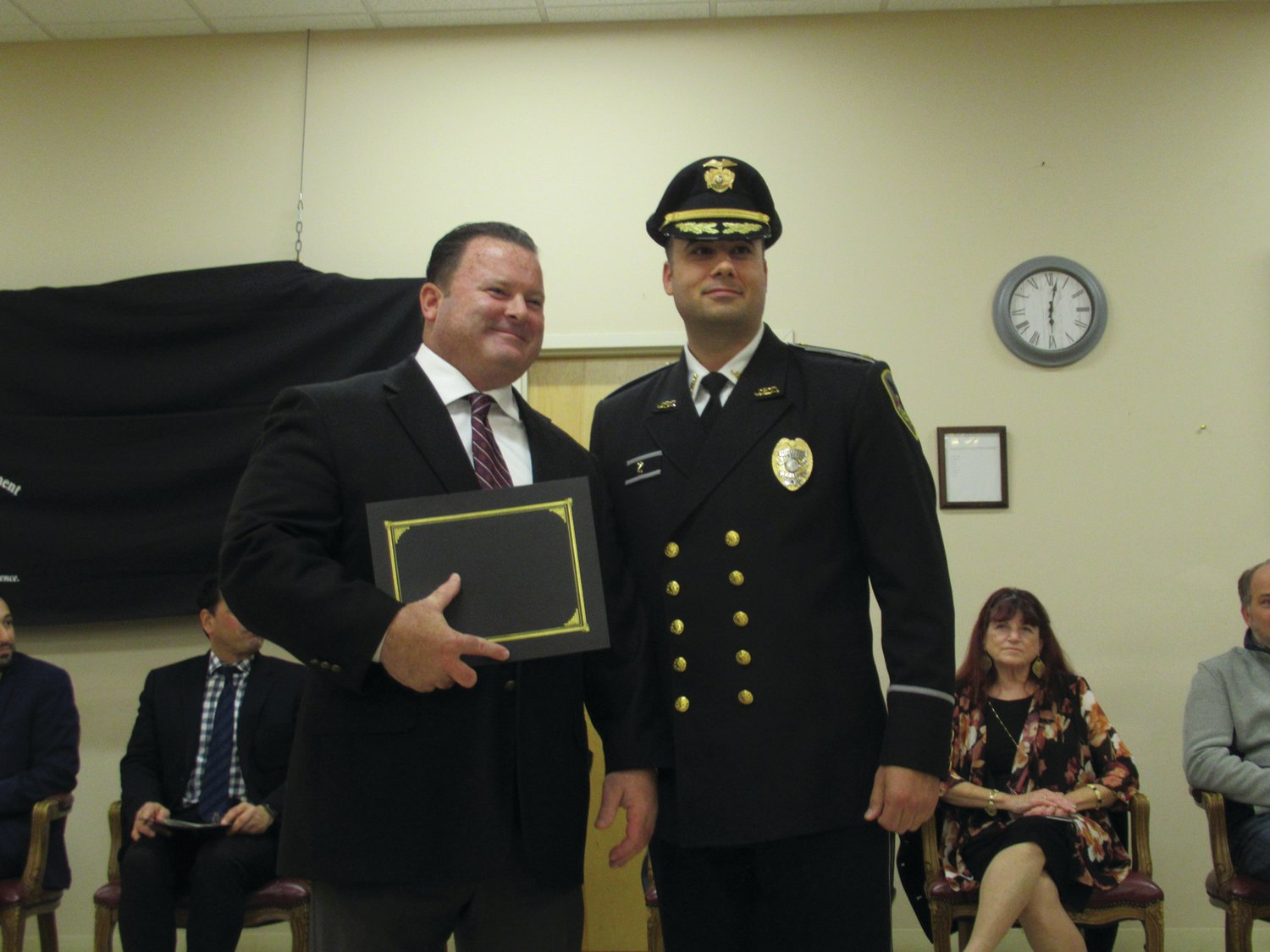 LETTER LINK: JPD Deputy Chief Mark Vieira presents Detective Tom Dwyer with a Letter of Recognition Award during the impressive and recent police awards ceremony.